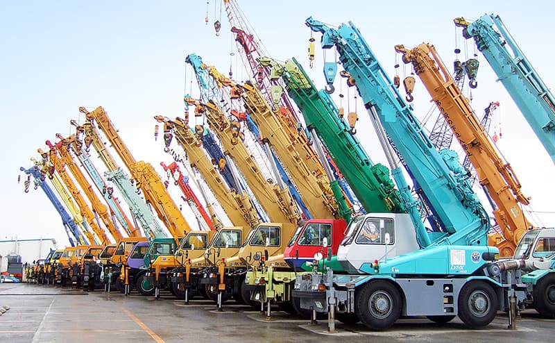 Construction equipment being prepared for shipping